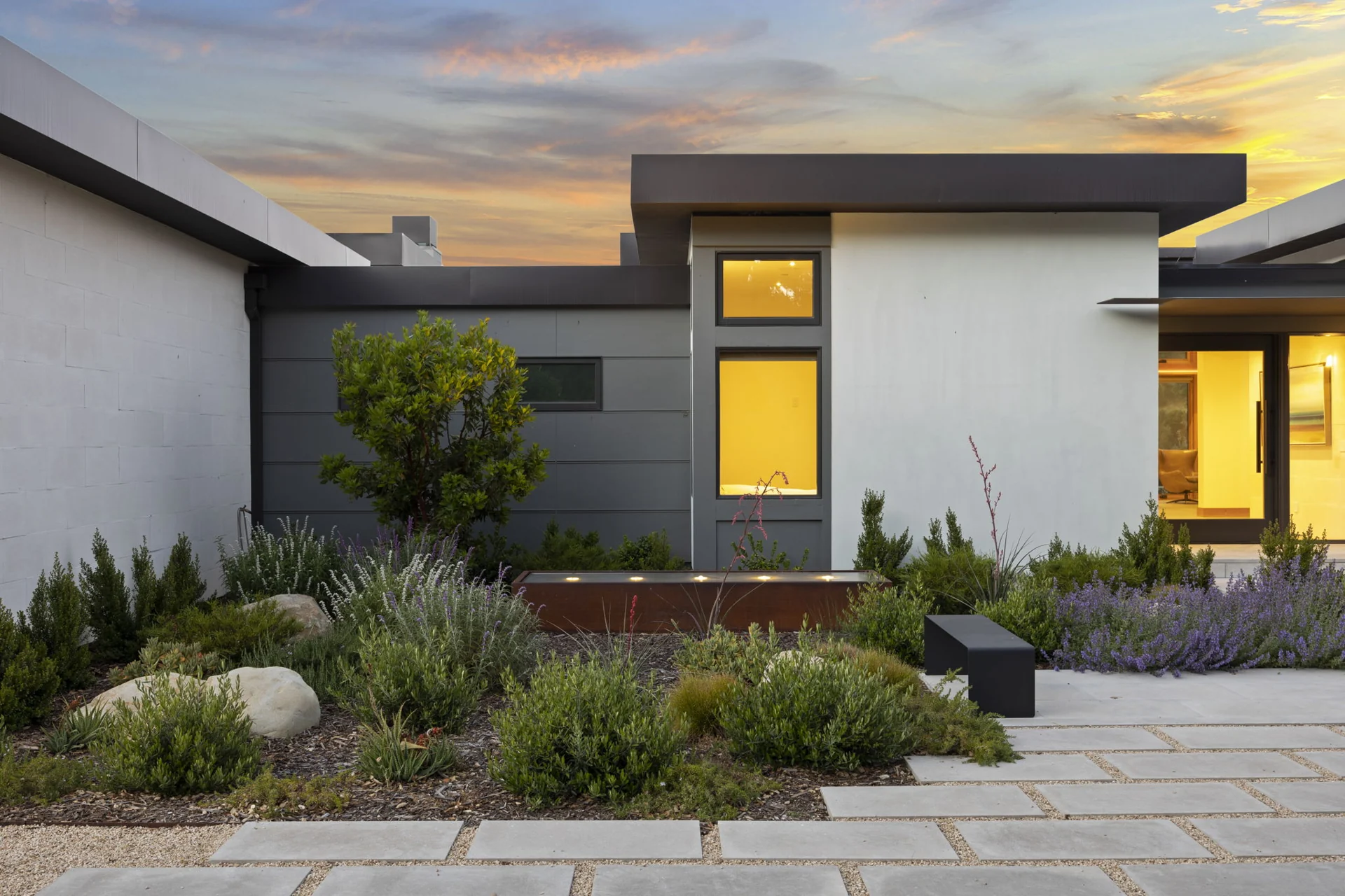 Landscaped entry courtyard and modern facade